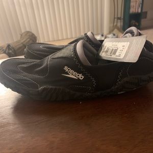Black Speedo water shoes
